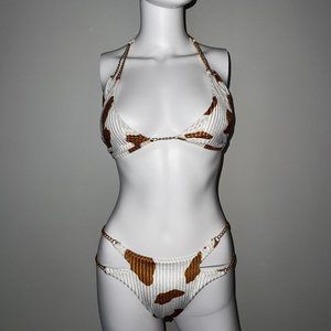 brown cow print with gold chain
